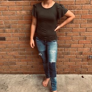 Black and green striped T-shirt with ruffles